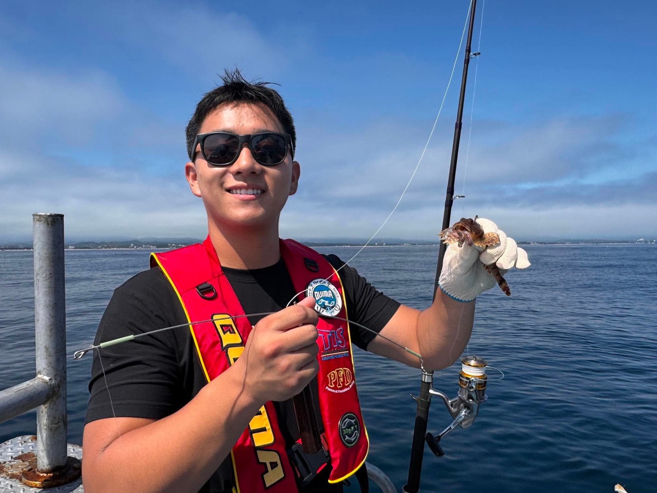 Vince fishing on the water
