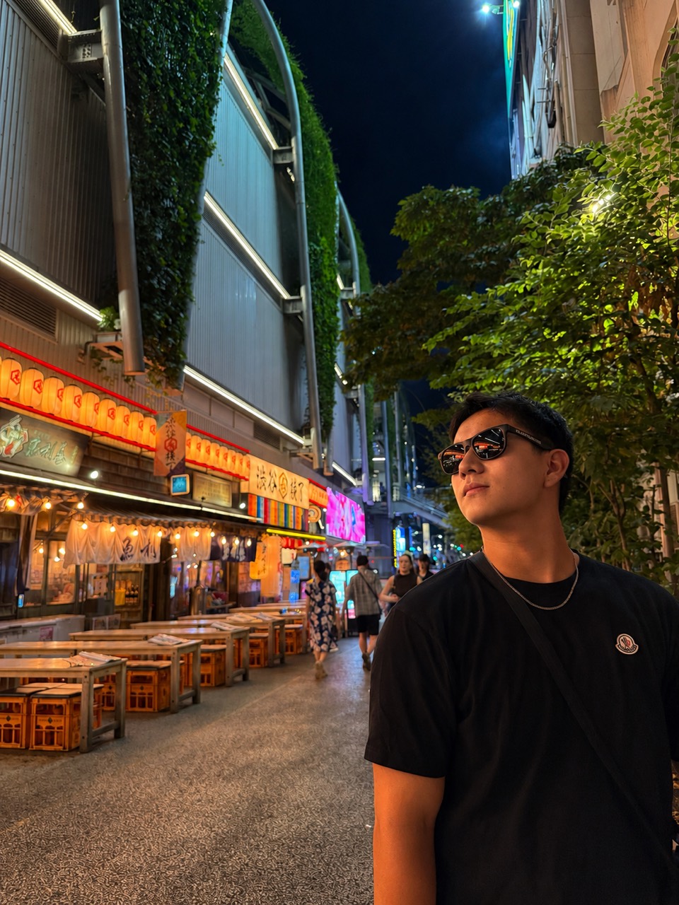 Vince exploring a city at night