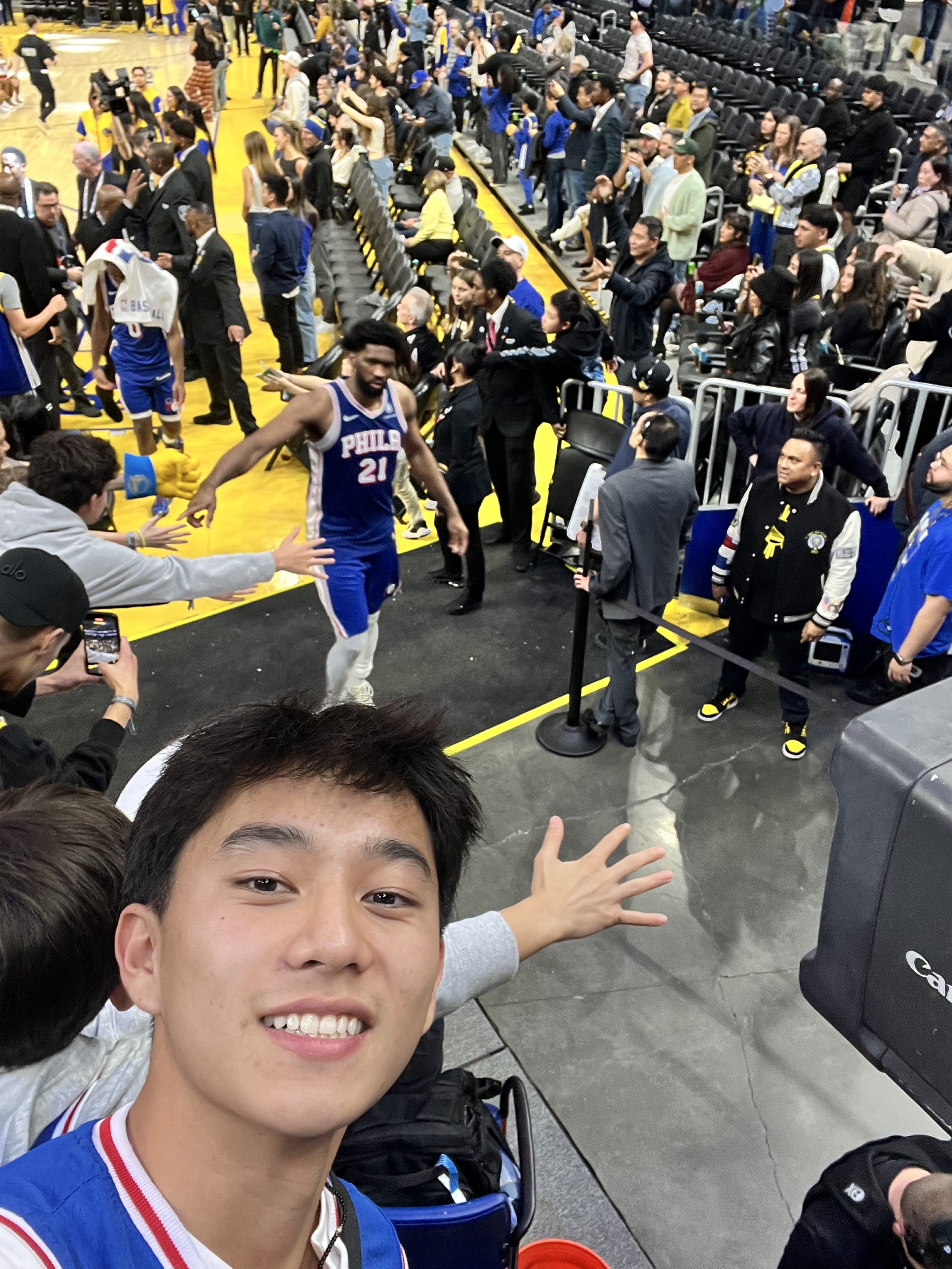 Vince courtside as Joel Embiid leaves the floor